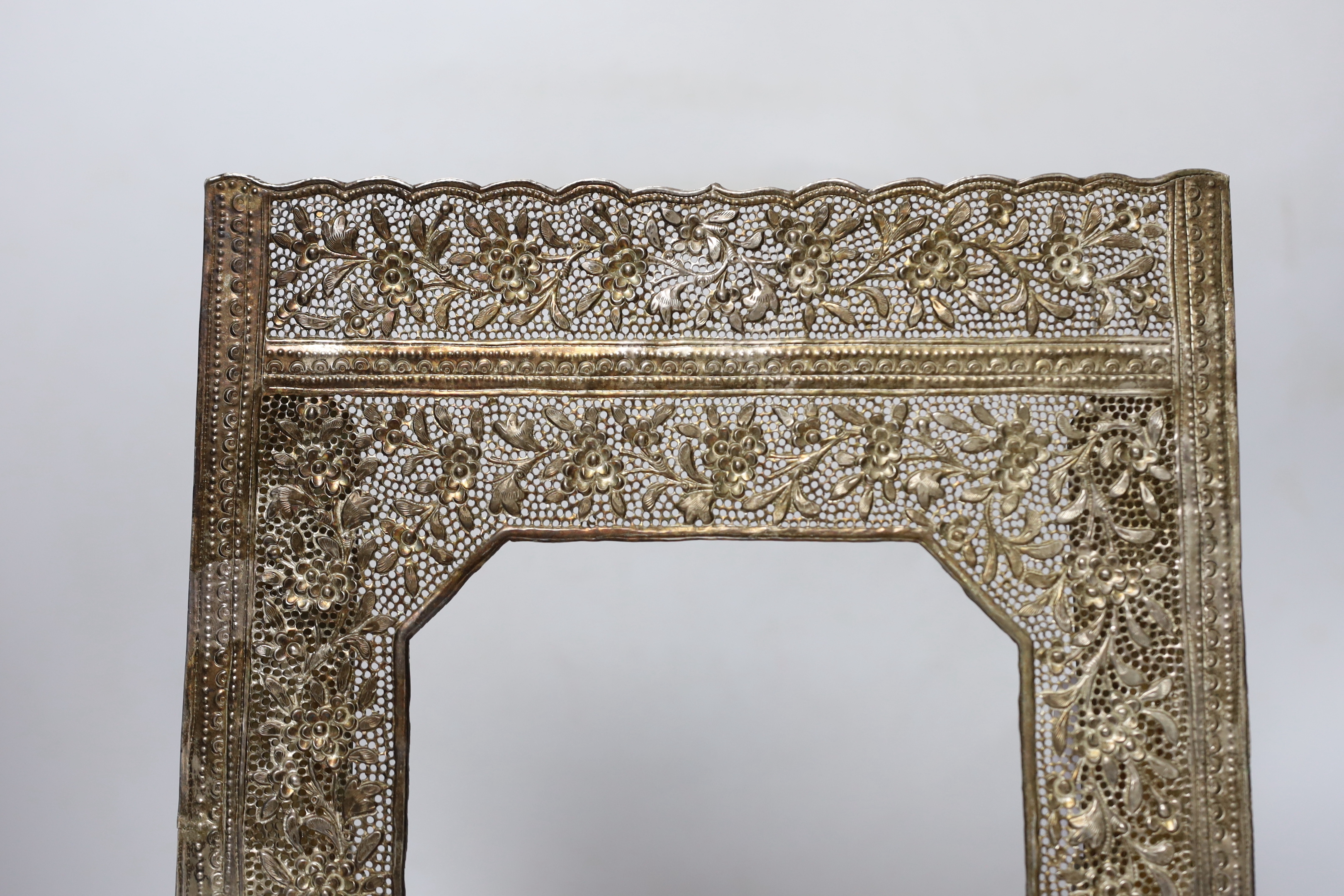 An Indian metal photo easel frame, 37 x 25cm total